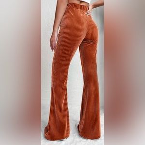 Orange velvet flare pants